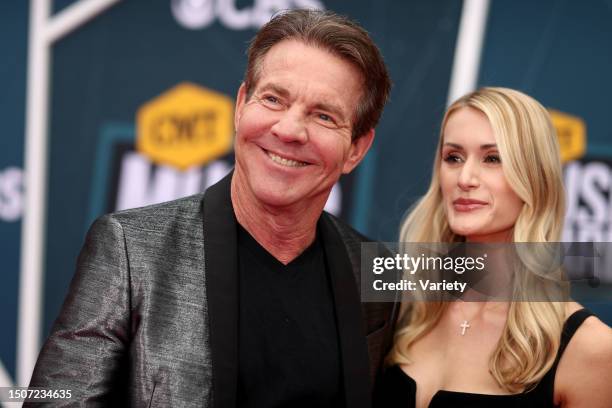 Dennis Quaid and Laura Savoie at the 2022 CMT Music Awards held at Nashville Municipal Auditorium on April 11th, 2022 in Nashville, Tennessee, USA.