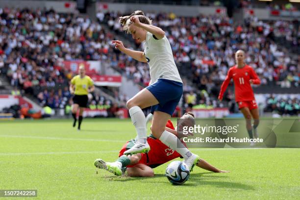 Niamh Charles of England is challenged by Telma Encarnacao of Portugal during the Women's International Friendly match between England and Portugal...
