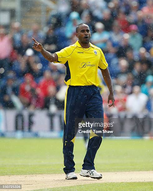 Dimiti Mascarenhas of Hampshire celebrates taking the wicket of Richard Levi of Somerset during the Friends Life T20 Semi Final match between...