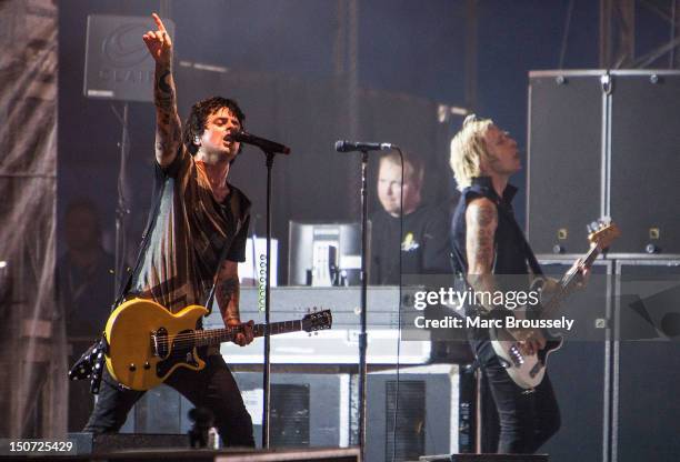 Billie Joe Armstrong and Mike Dirnt of Green Day perform on the NME/Radio1 stage during Day 2 of Reading Festival at Richfield Avenue on August 25,...