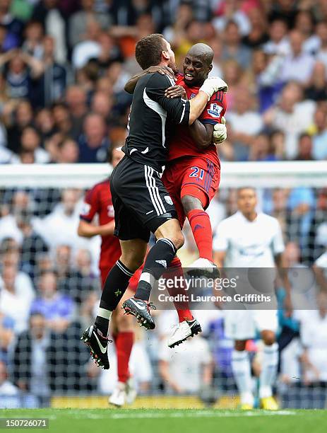 Youssouf Mulumbu of West Bromwich Albion celebrates the late goal scored by James Morrison with goalkeeper Ben Foster during the Barclays Premier...