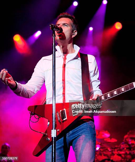 Vocalist/guitarist Nick Hexum of 311 performs onstage at Verizon Wireless Amphitheatre on August 24, 2012 in Laguna Hills, California.