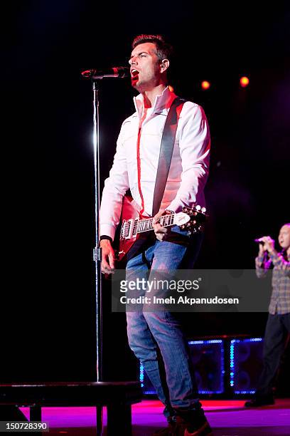 Vocalist/guitarist Nick Hexum of 311 performs onstage at Verizon Wireless Amphitheatre on August 24, 2012 in Laguna Hills, California.