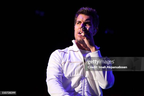 Vocalist/guitarist Nick Hexum of 311 performs onstage at Verizon Wireless Amphitheatre on August 24, 2012 in Laguna Hills, California.