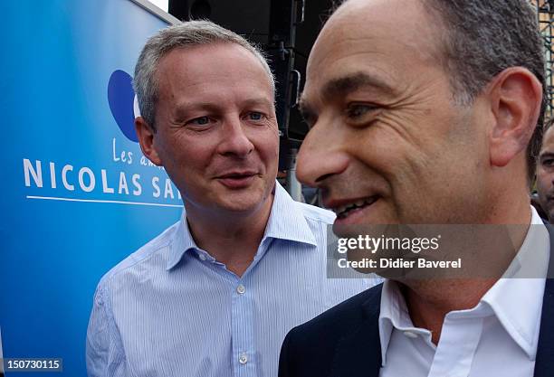 Former minister Bruno Lemaire and General secretary of UMP party , Jean Francois Cope arrive at second day of the first Rally of the association The...