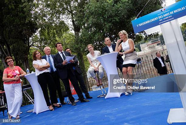 Former minister Nadine Morano , General secretary of UMP party , Jean Francois Cope and Nathalie Kosciusko Morizet on stage during the speech of...