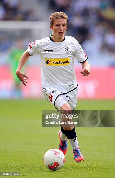 Alexander Ring of Moenchengladbach runs with the ball during the Bundesliga match between VfL Borussia Moenchengladbach and TSG 1899 Hoffenheim at...