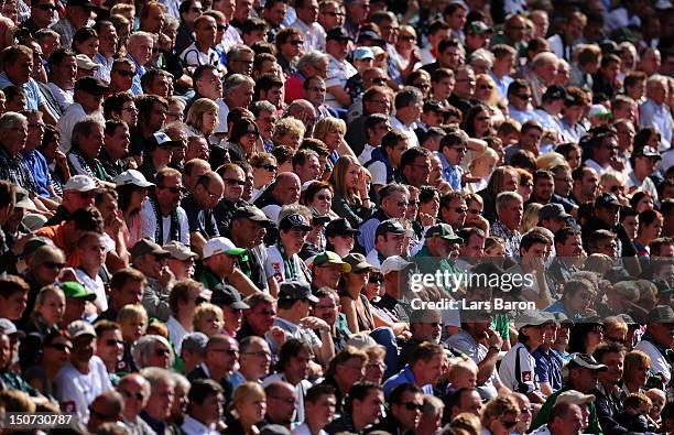 Fans are seen during the Bundesliga match between VfL Borussia Moenchengladbach and TSG 1899 Hoffenheim at Borussia Park Stadium on August 25, 2012...