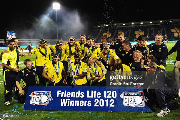 Hampshire captain Dimitri Mascarenhas lifts the trophy and celebrates with his team mates after the final of the Friends Life T20 between Hampshire...