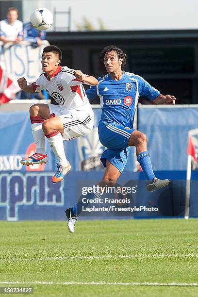 Alessandro Nesta of the Montreal Impact and Conor Shanosky of the D.C. United heads the ball during the MLS match at Saputo Stadium on August 25,...