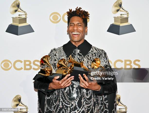 John Batiste, winner of Best American Roots Performance for "Cry," poses in the press room at the 64th Annual Grammy Awards held at the MGM Grand...