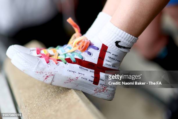 Detailed view of shoes worn by an England fan during the Women's International Friendly match between England and Portugal at Stadium mk on July 01,...