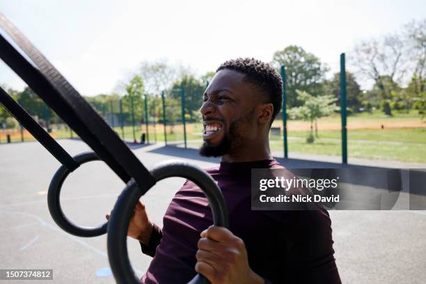 a man fitness training in his local park - health and well being - pursuit sports competition format stock pictures, royalty-free photos & images