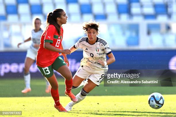 Sabah Seghir of Morocco competes for the ball with Valentina Giacinti of Italy during the Women´s International Friendly match between Italy and...