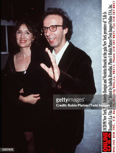 New York, NY. Nicoletta Braschi and Roberto Benigni at the gala New York premiere of "Life Is Beautiful ," hosted by Isabella Rossellini.