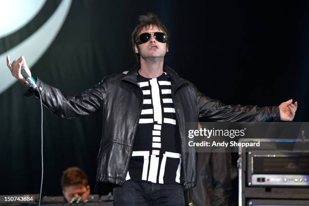 Tom Meighan of the band Kasabian performs on stage during Reading Festival 2012 at Richfield Avenue on August 25, 2012 in Reading, United Kingdom.