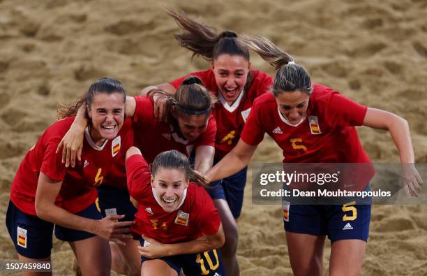 Adriana Manau, Jesica Higueras and Lorena Del C. Asensio of Spain celebrate victory in the penalty shoot out in the Beach Soccer - Women's Gold Medal...