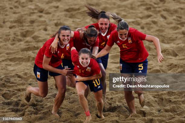 Adriana Manau, Jesica Higueras and Lorena Del C. Asensio of Spain celebrate victory in the penalty shoot out in the Beach Soccer - Women's Gold Medal...