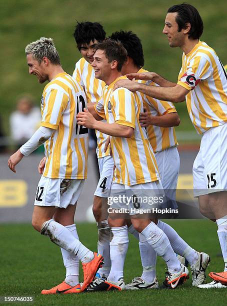 To R David Mulligan, Kris Carpenter, Jason Hicks and Ivan Vicelich of Central United celebrate a goal during the 2012 Chatham Cup Final match between...