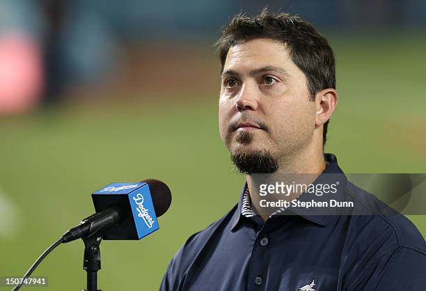 Pitcher Josh Beckett of the Los Angeles Dodgers speaks at a press conference after the game with the Miami Marlins on August 25, 2012 at Dodger...