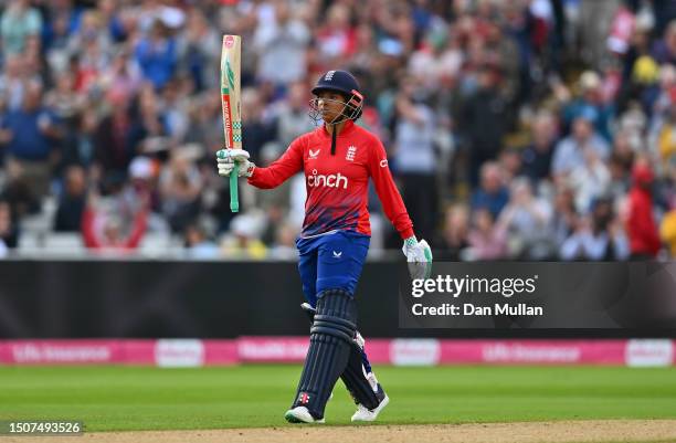 Sophia Dunkley of England celebrates after reaching her half century during the Women's Ashes 1st Vitality IT20 match between England and Australia...