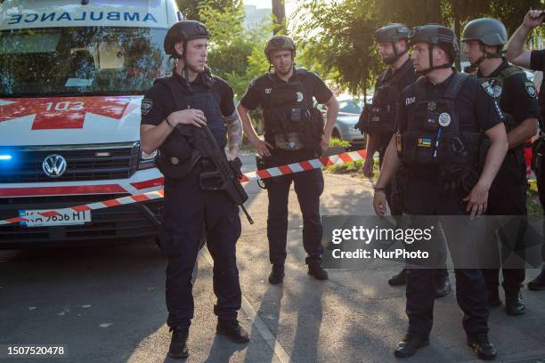 Police officers work outside the Shevchenkivskyi District Court of Kyiv where an unidentified explosive device was detonated by a man brought to a...