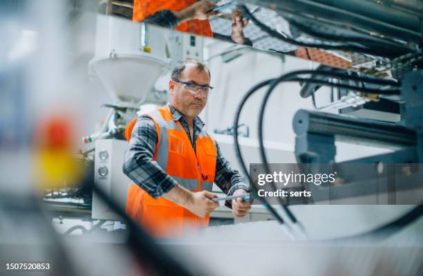 metalworking cnc milling machine at work. the mold and die manufacturing process. - rymdindustri bildbanksfoton och bilder