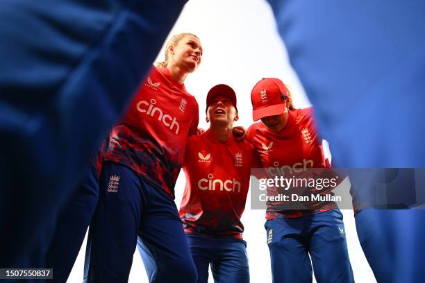 Heather Knight of England talks to her team mates in a huddle prior to fielding during the Women's Ashes 1st Vitality IT20 match between England and...