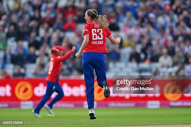Lauren Bell of England celebrates taking the wicket of Alyssa Healy of Australia during the Women's Ashes 1st Vitality IT20 match between England and...