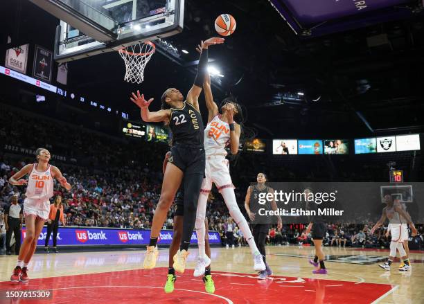 Ja Wilson of the Las Vegas Aces blocks a shot by DeWanna Bonner of the Connecticut Sun in the second quarter of their game at Michelob ULTRA Arena on...