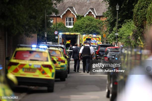 Police and emergency services attend the scene of a car crash at a school on July 6, 2023 in Wimbledon, England. A Land Rover has reportedly crashed...