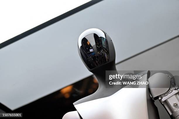 Tesla robot is seen on display during the World Artificial Intelligence Conference in Shanghai on July 6, 2023.