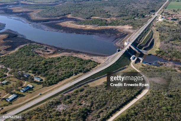 Aerial view of the Paso Severino reservoir on July 01, 2023 in Florida, Uruguay. 'La Niña' climatic phenomenon has brought Uruguay to a water...