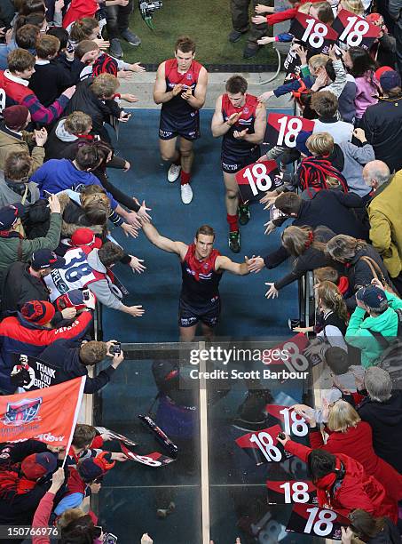 Brad Green of the Demons walks down the players tunnel as he leaves the field after playing his last match after the round 22 AFL match between the...