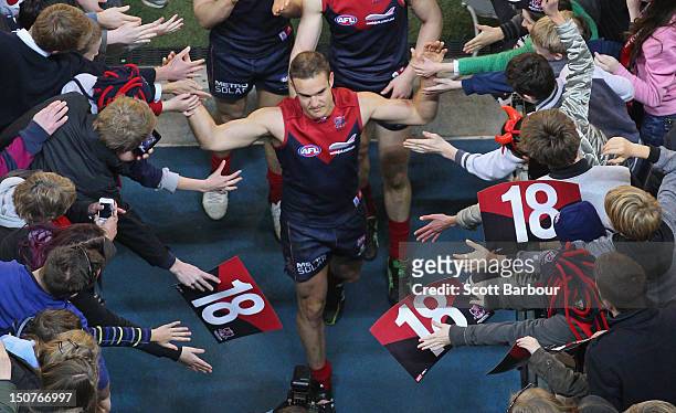 Brad Green of the Demons walks down the players tunnel as he leaves the field after playing his last match after the round 22 AFL match between the...