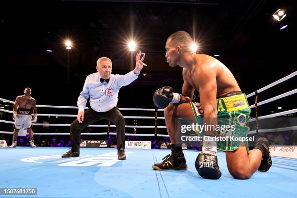 Esquiva Falcao Florentino of Brazil is counted during the IBF World Championship Middleweightz fight between Esquiva Falcao Florentino of Brazil and...