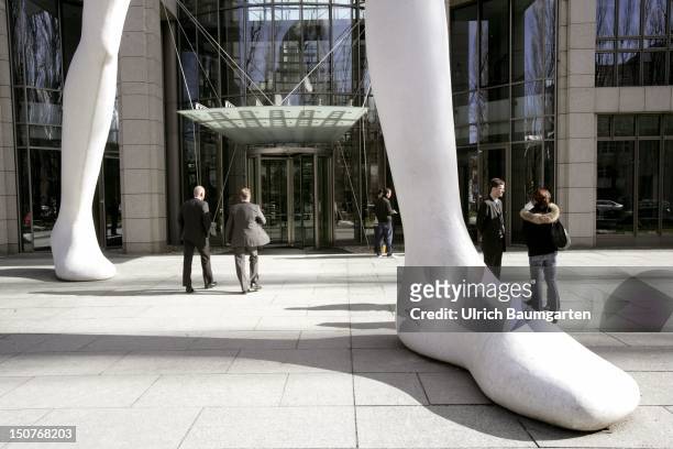 Walking Man, sculpture by Jonathan Borofsky, in front of the building of the Muenchener Rueckversicherung insurance company in Munich.