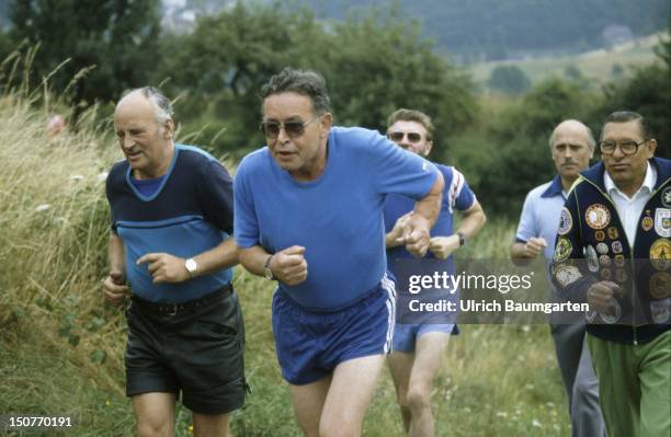 Senior citizens doing sports .