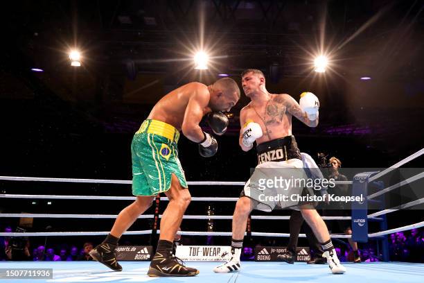 Vincenzo Gualtieri of Germany hits Esquiva Falcao Florentino of Brazil during the IBF World Championship Middleweightz fight between Esquiva Falcao...