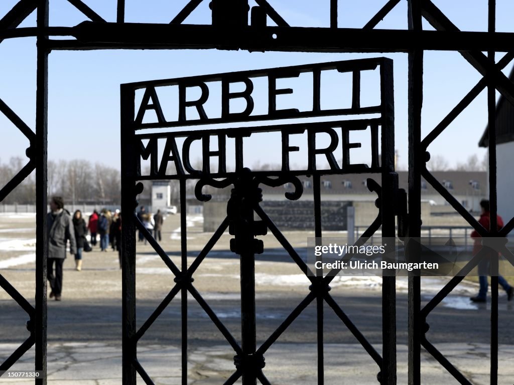 GERMANY, DACHAU, Concentration camp memorial place Dachau, O,p,s, Gate of the former concetration camp Dachau with the writing sign Arbeit macht frei - Work Brings Freedom.