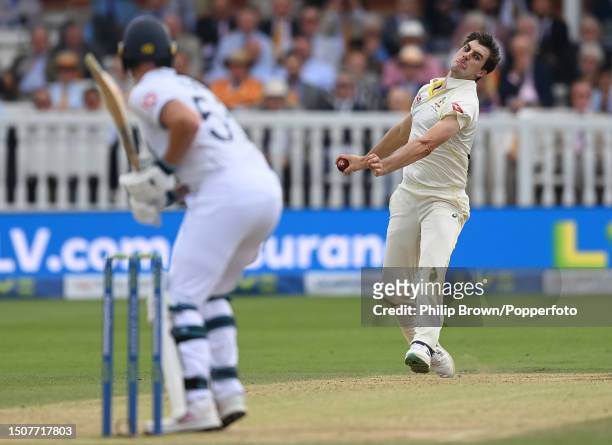 Pat Cummins of Australia bowls to Ben Stokes of England during the fourth day of the 2nd Test match between England and Australia at Lord's Cricket...