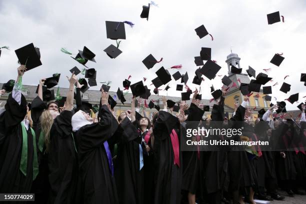 Graduates with academic gown and birettas during graduation ceremony at the Rheinische Friedrich-Wilhelms-University Bonn, O,p,s, After the...