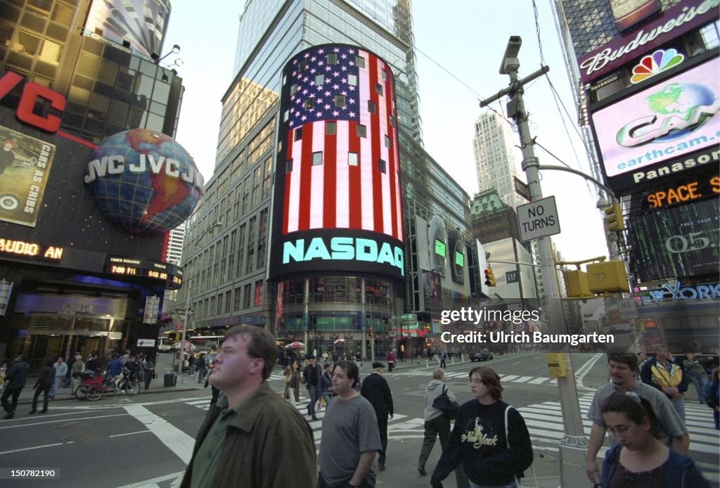 Time Square with NASDAQ display ( the largest LCD display in the world ), on whitch the American flag is shown.