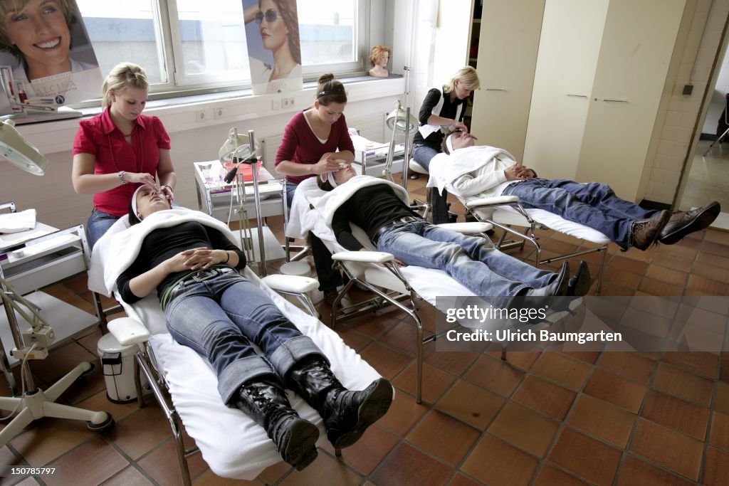GERMANY, COLOGNE, A cosmetician who's being trained at the - Bildungszentrum Butzweiler Hof der Handwerkskammer Koeln -.