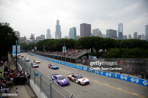 Cole Custer, driver of the HAAS Automation Ford, John Hunter Nemechek, driver of the Yahoo Toyota, race during the NASCAR Xfinity Series The Loop 121...