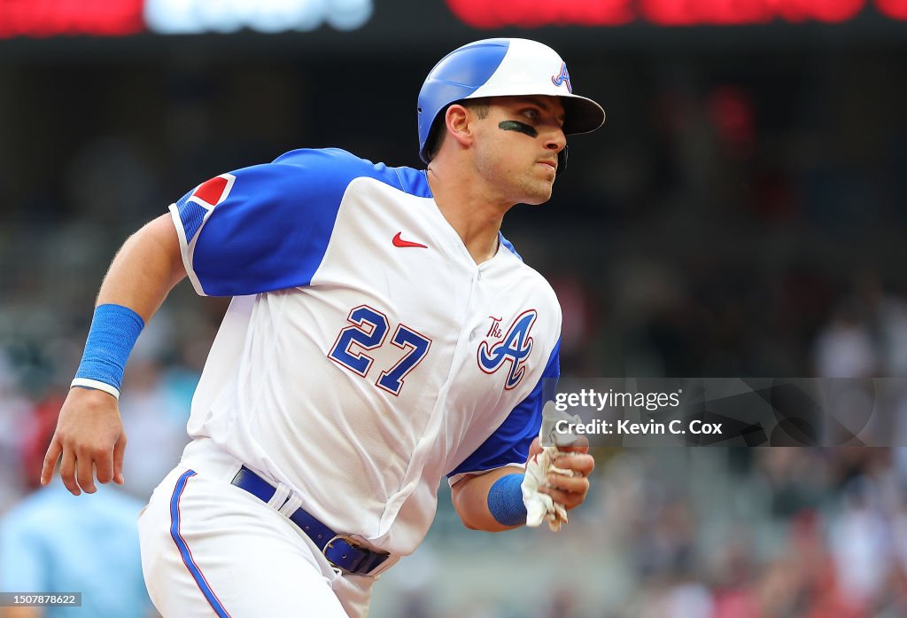 Austin Riley Third Base Austin Riley of the Atlanta Braves rounds third base on the way to ...