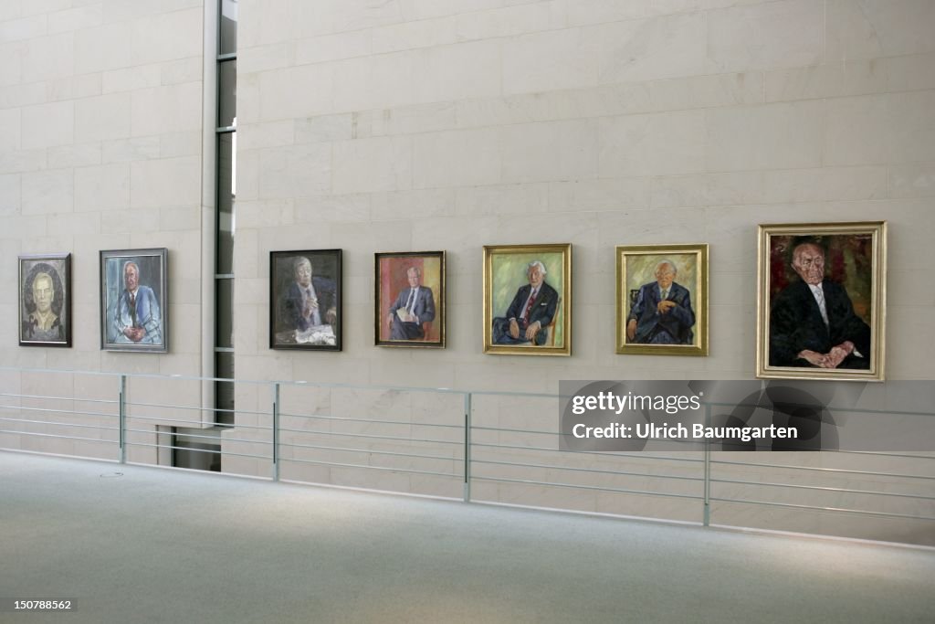 Germany, Berlin, Ancestral portrait gallery in the chancellery: the former chancellors (f,r,) Adenauer, Erhardt, Kiesinger, Brandt, Schmidt, Kohl, Schroeder.