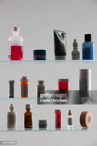 medicine cabinet full of drugs - medicine cabinet stock pictures, royalty-free photos & images