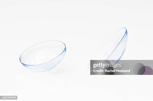 close up of a pair of contact lens - lente de contacto imagens e fotografias de stock