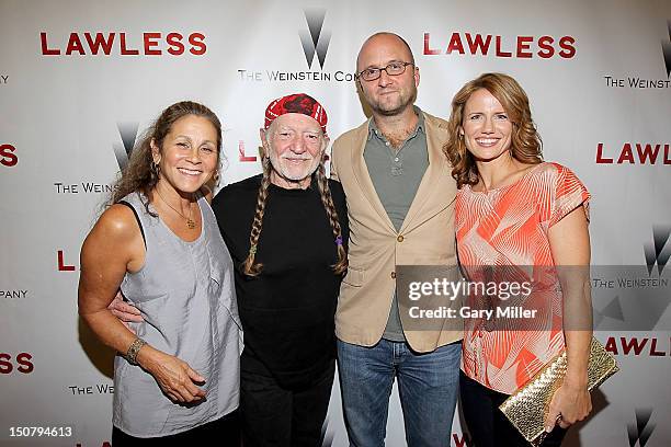 Annie Nelson, musician Willie Nelson, author Matt Bondurant and Stacy Bondurant on the red carpet for the new film Lawless at the Alamo Drafthouse on...